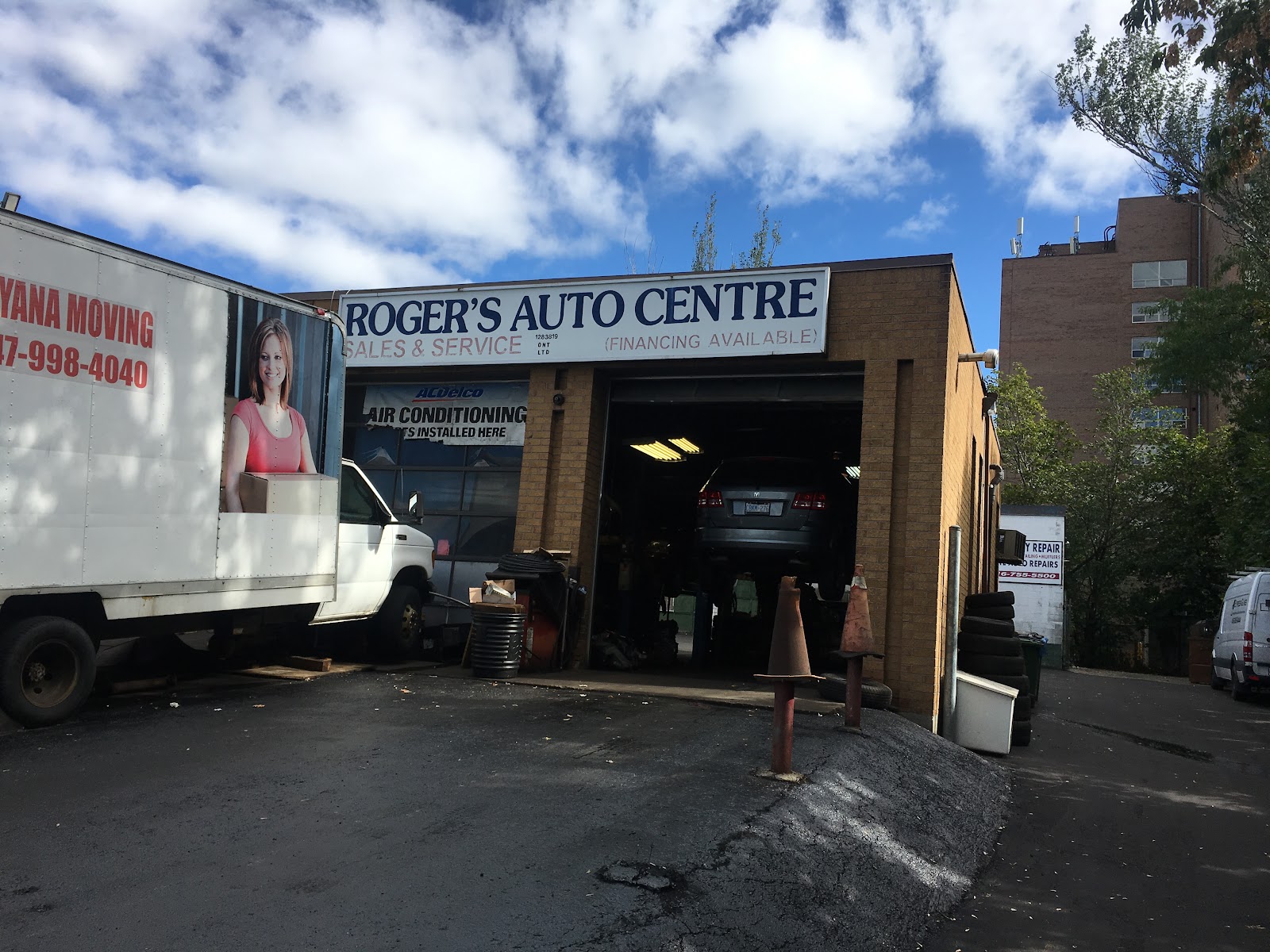 The exterior of Roger&rsquo;s Auto Centre on O&rsquo;Connor Drive, sign reading Sales & Service, Financing Available.